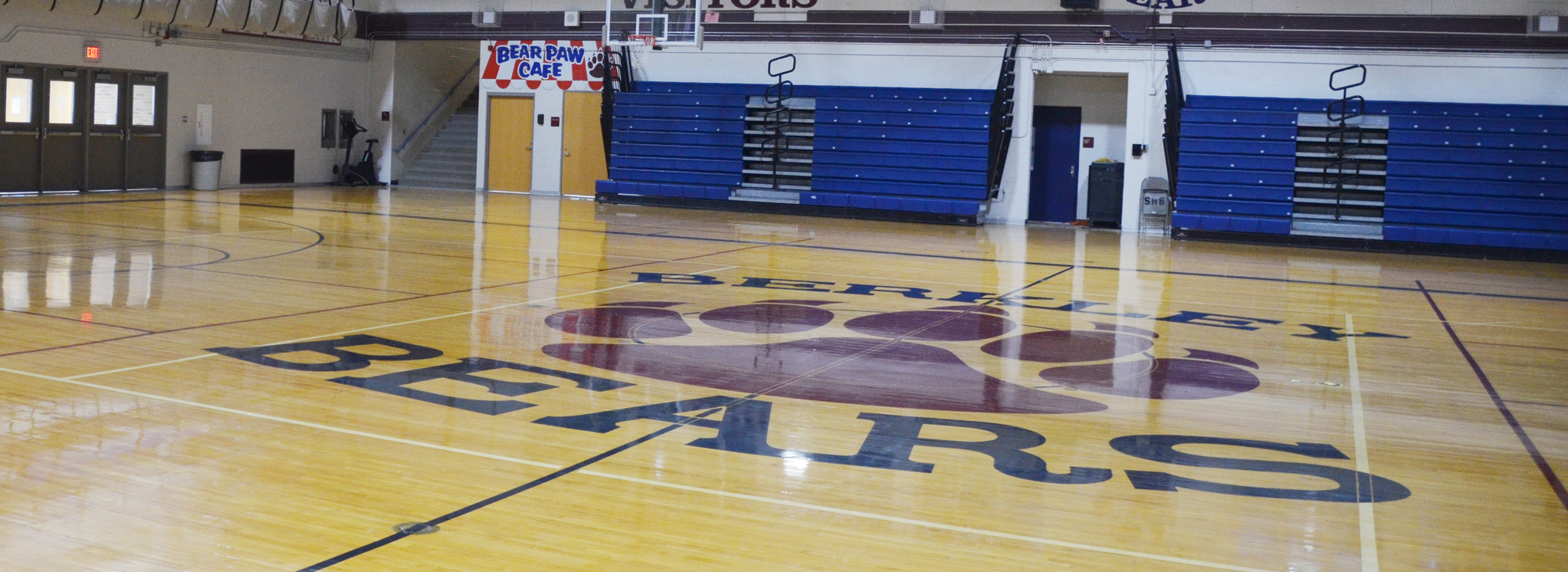 Photo of a gym floor with a bear paw and the words Berkley Bears in the center of it.