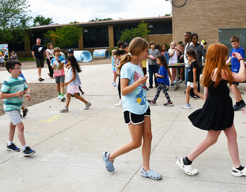 On Friday, June 7, Burton’s PTA hosted the annual Ice Cream Social. This year, students enjoyed face painting, dancing with a DJ, a prize walk, dunk tank, hot dogs, baseball games, popcorn and ice cream from Treat Dreams. Students played in the field and on the playground, too.